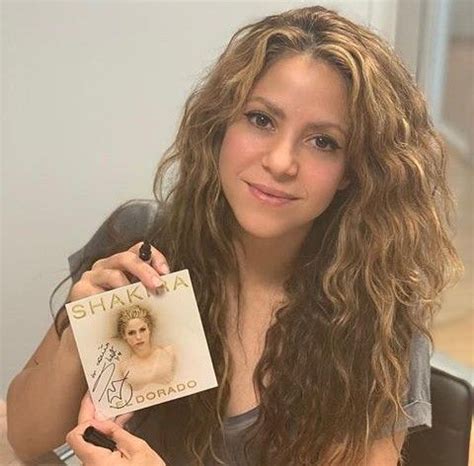 does shakira write her own songs